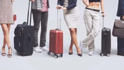 A group of people with luggage